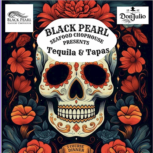 A skull centerpiece framed by red flowers invites Tequila & Tapas at Black Pearl Seafood & Lounge, Wed Dec 3rd 6 PM&mdash;$125 per person.